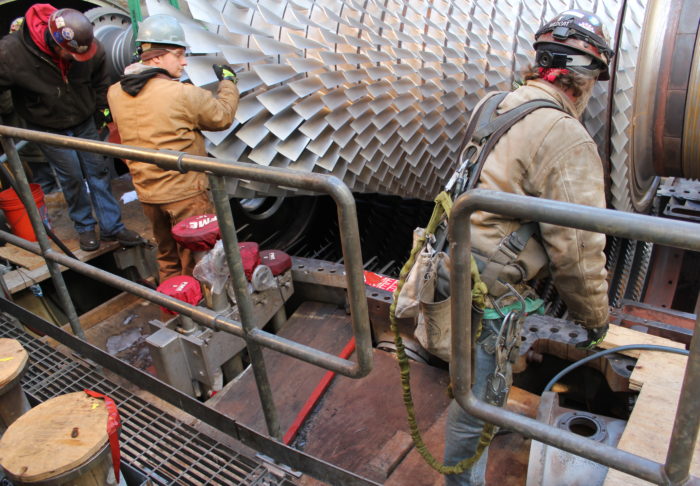 UBC millwrights working on turbine blades