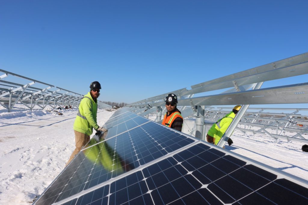 UBC millwrights inspecting solar panels