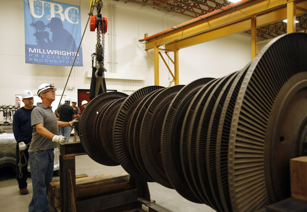 UBC millwrights moving turbine